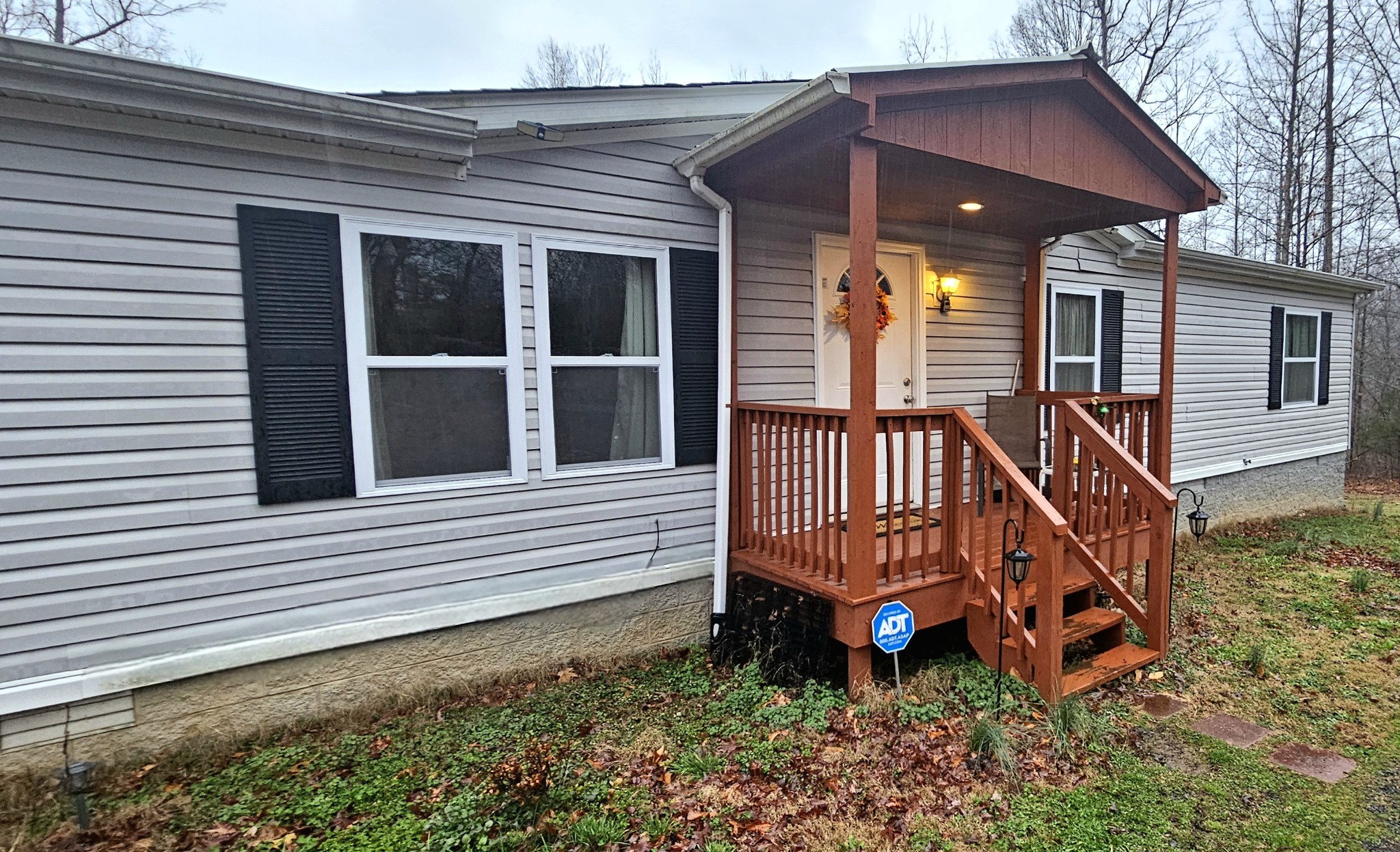8006 Ridgewood Road Goodlettsville, TN 37072 - Photo 1 of 19 a backyard of a house with wooden floor and fence