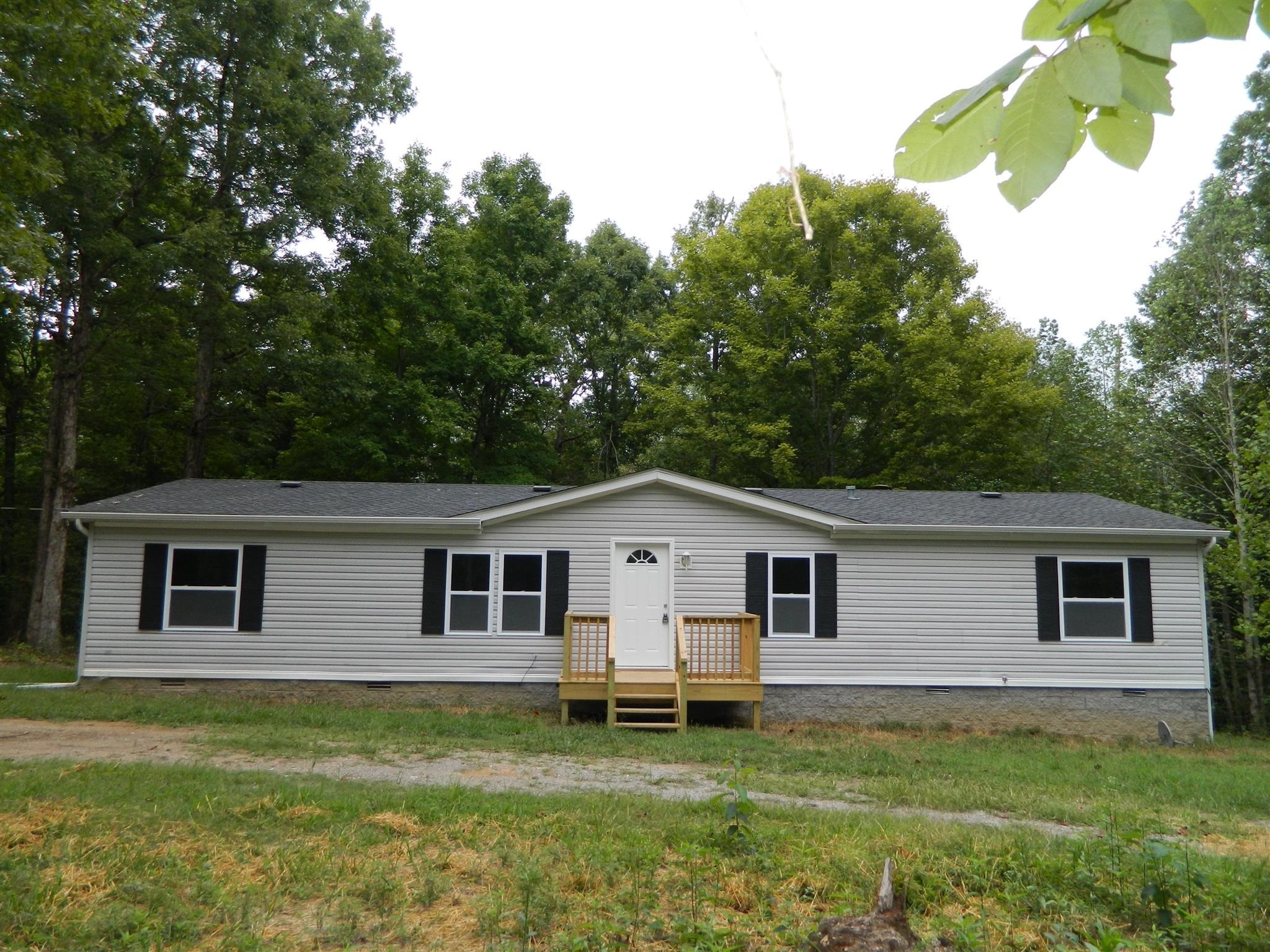 8006 Ridgewood Road Goodlettsville, TN 37072 - Photo 2 of 19 a view of a house with a backyard