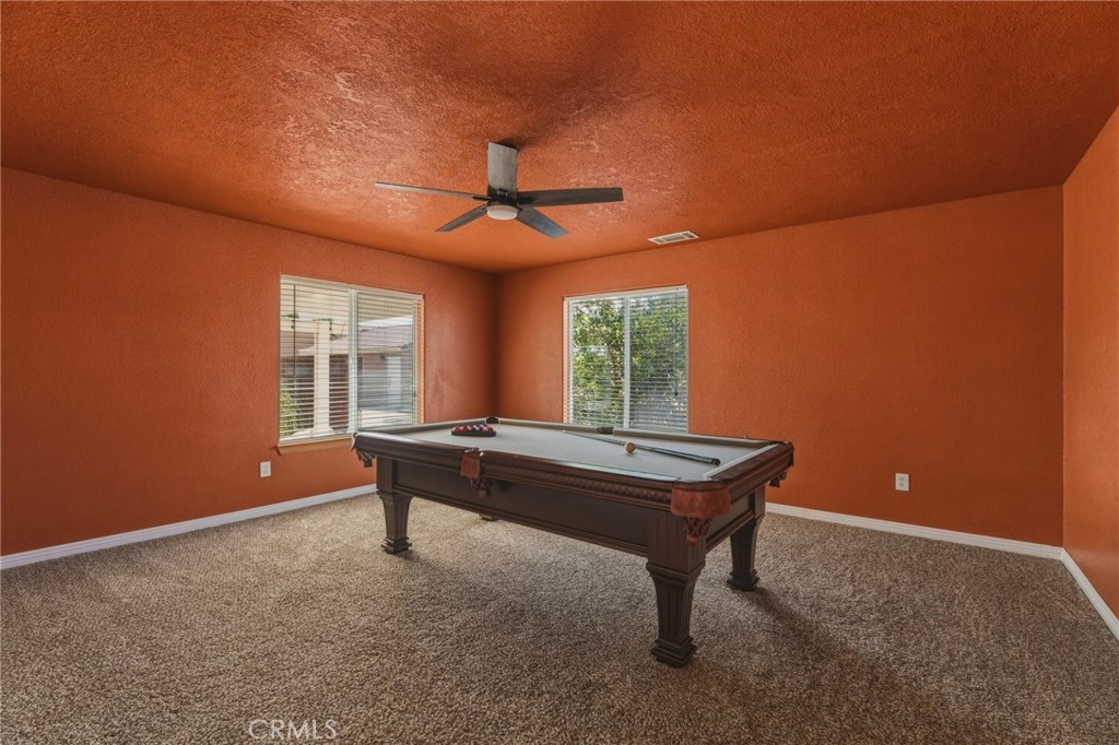 19501 Kinai Road Apple Valley, CA 92307 - Photo 24 of 49 a room with pool table and windows