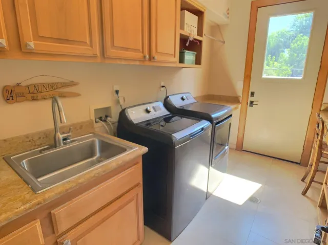 a view of yard with patio