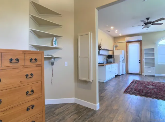 a living room with furniture or couch and a fireplace
