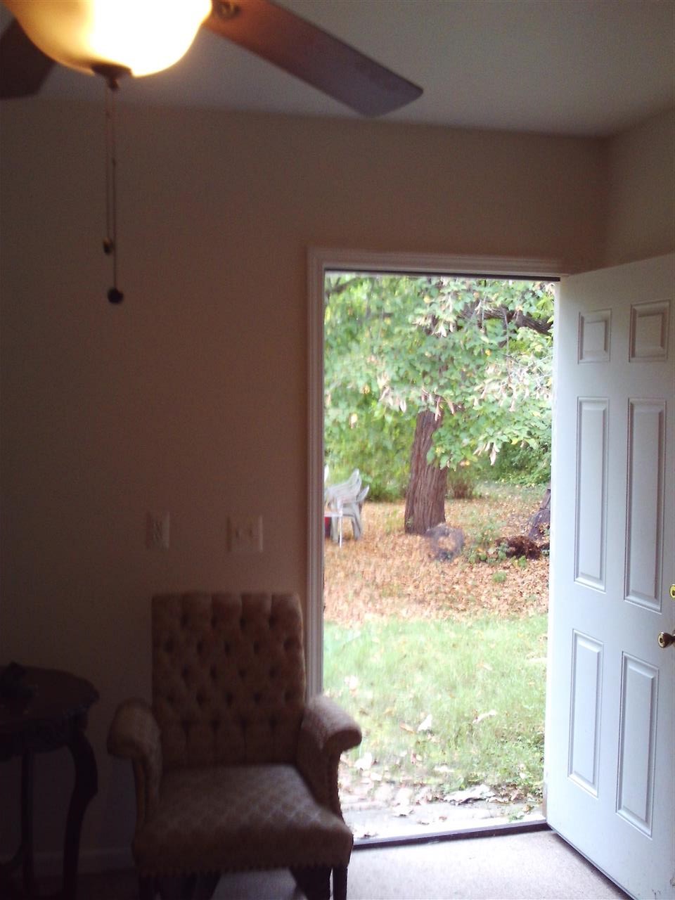 21469 Greenview Road Southfield, MI 48075 - Photo 11 of 19 Back door from the breezeway leading out to the back yard. The door to the main area is to the right, and the door to the garage is on the left (not shown).