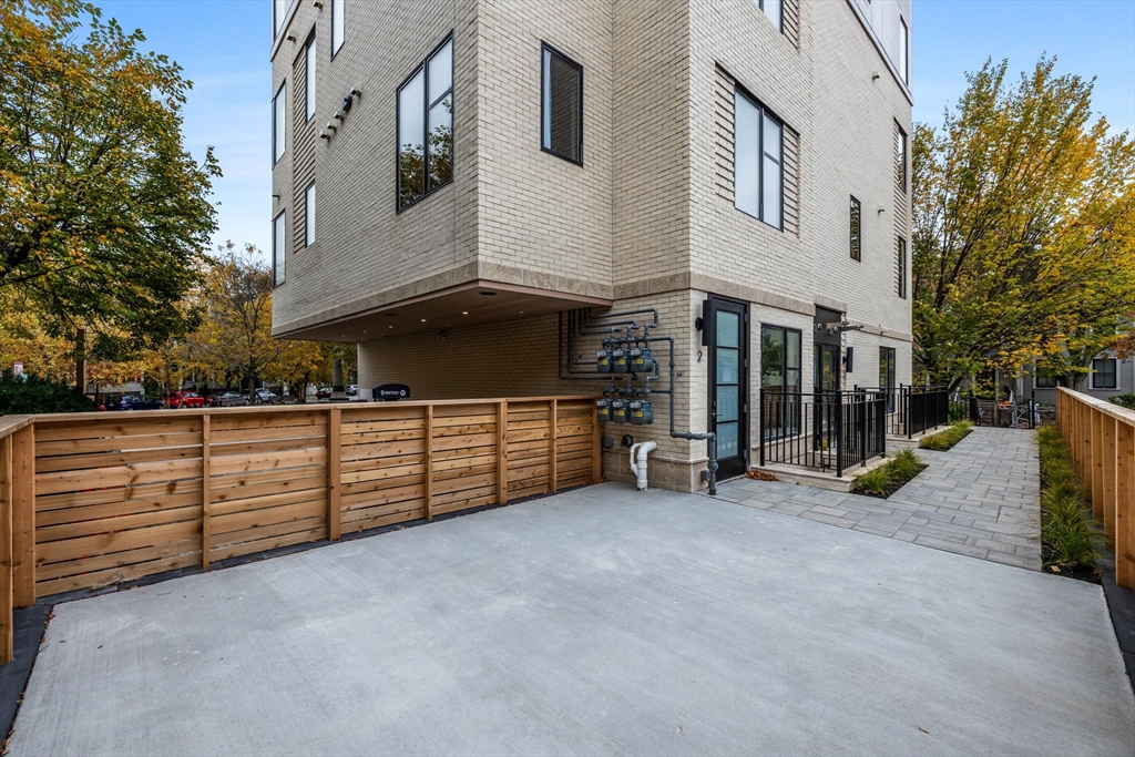 300 Franklin Street, Unit 2 Cambridge, MA 02139 - Photo 2 of 17 a view of a house with a garage