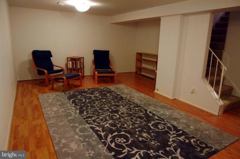 2440 Alsop Court Reston, VA 20191 - Photo 12 of 21 a living room with furniture and a rug
