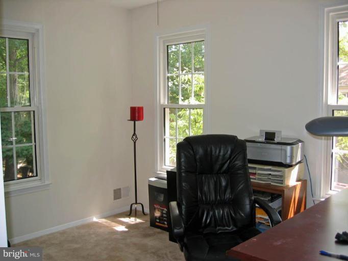 2440 Alsop Court Reston, VA 20191 - Photo 14 of 21 a living room with furniture and a window