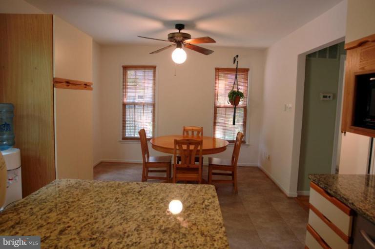2440 Alsop Court Reston, VA 20191 - Photo 9 of 21 a dining room with furniture and window