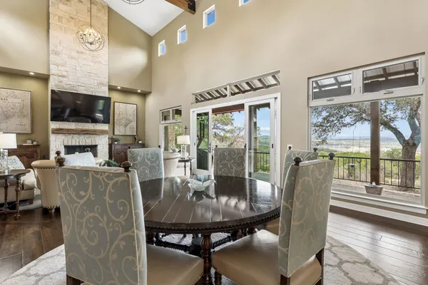a view of a dining room with furniture window and outside view