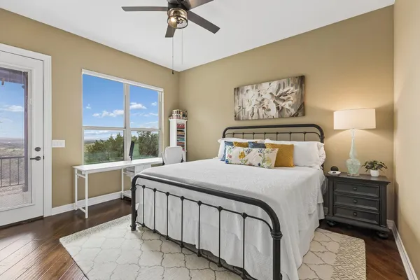 a bedroom with a bed and window