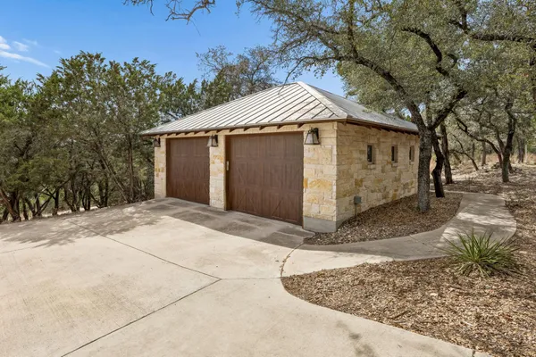 a small white house with a outdoor space