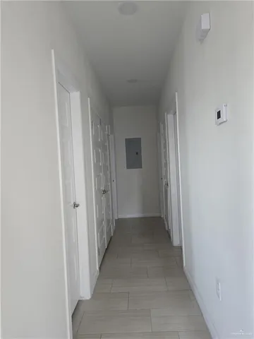 a view of hallway with closet