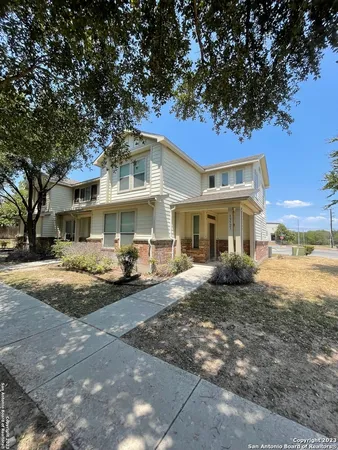 a front view of a house with yard porch and seating space
