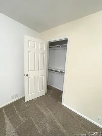 a bathroom with a sink a toilet and a shower