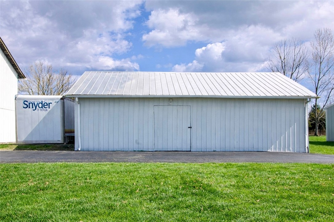 1000 Stone Road Xenia, OH 45385 - Photo 35 of 39 This structure features a robust metal roof, perfect for diverse storage needs.