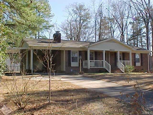 8605 Marigold Street Raleigh, NC 27603 - Photo 1 of 1 a front view of a house with garden