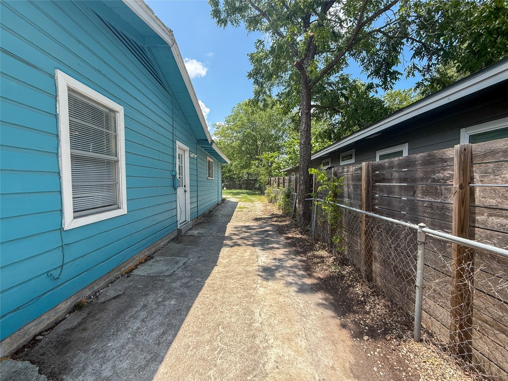 1412 Vargas Road, Unit A Austin, TX 78741 - Photo 15 of 32 a view of a backyard with pathway