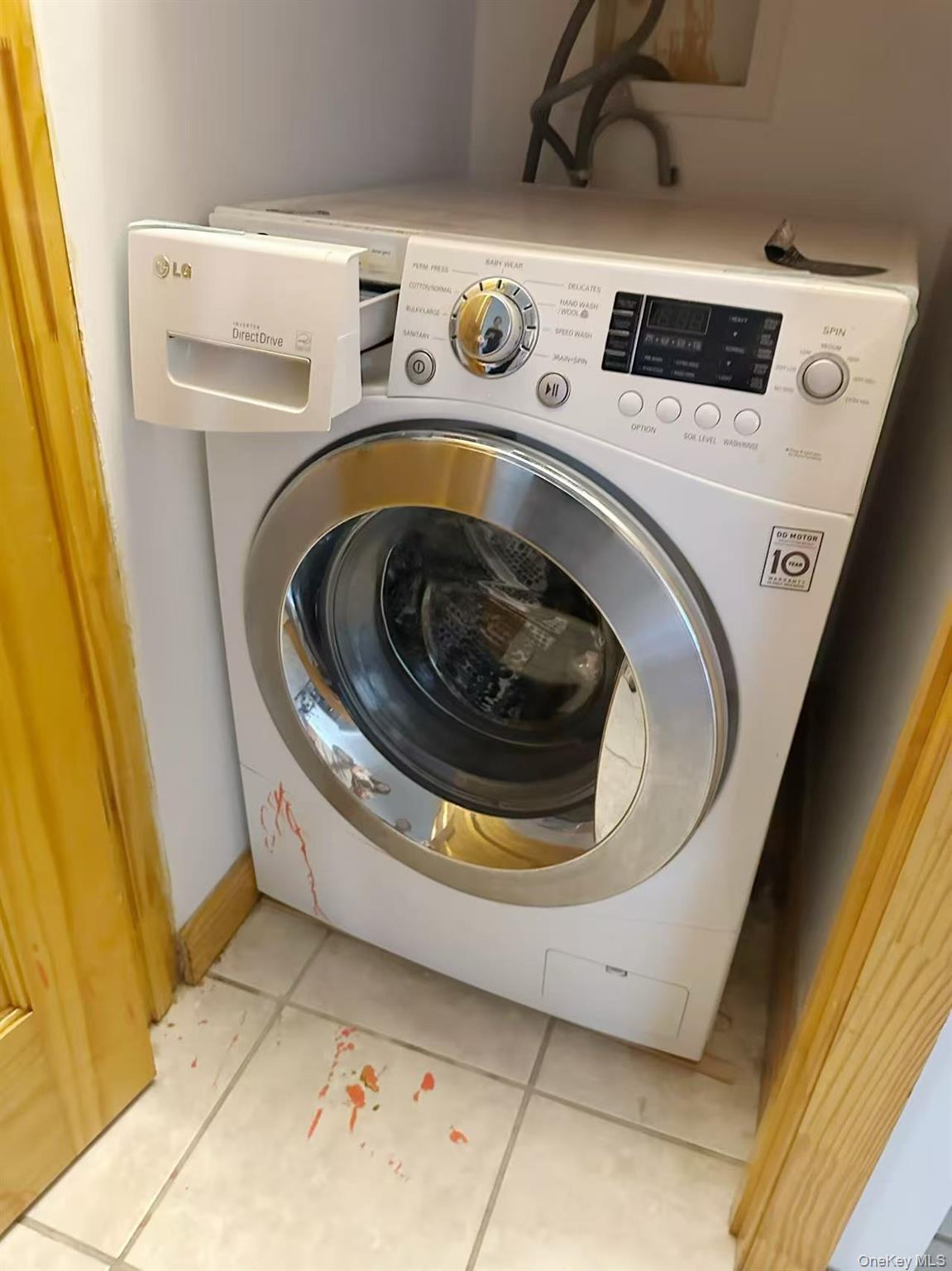 46-06 88th Street, Unit 5B Queens, NY 11373 - Photo 10 of 11 Washroom with washer / dryer and tile patterned floors