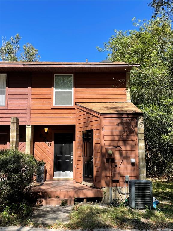 6720 Southwest 42nd Place Gainesville, FL 32608 - Photo 1 of 1 a view of a house with a small yard and plants