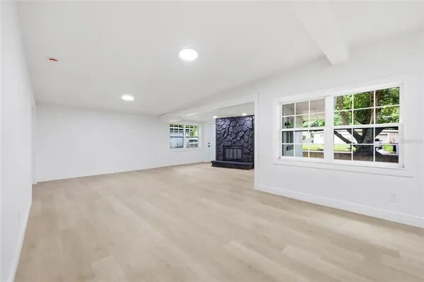 an empty room with windows
