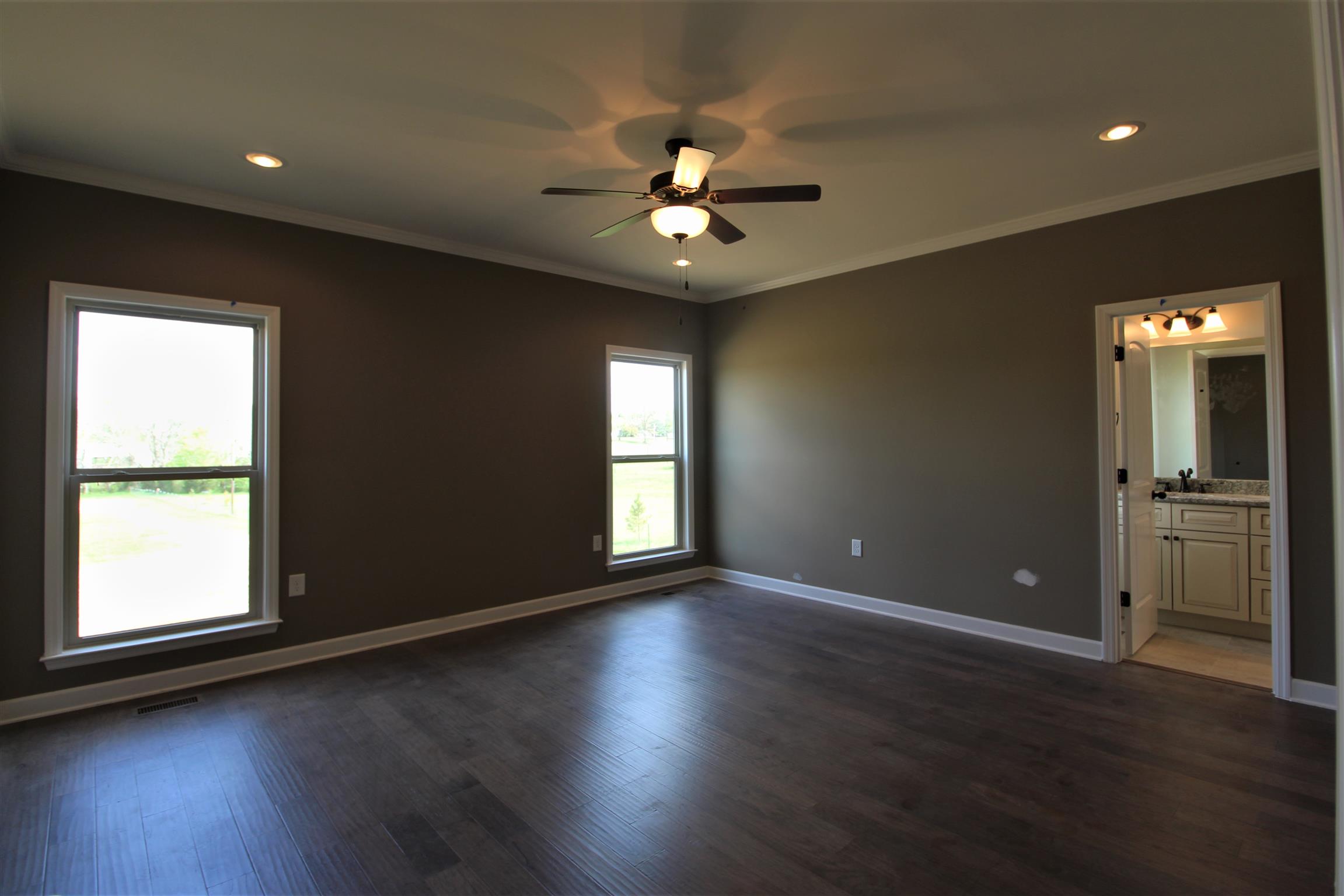 2521 Turner Road Watertown, TN 37184 - Photo 13 of 23 a view of an empty room with wooden floor and a window