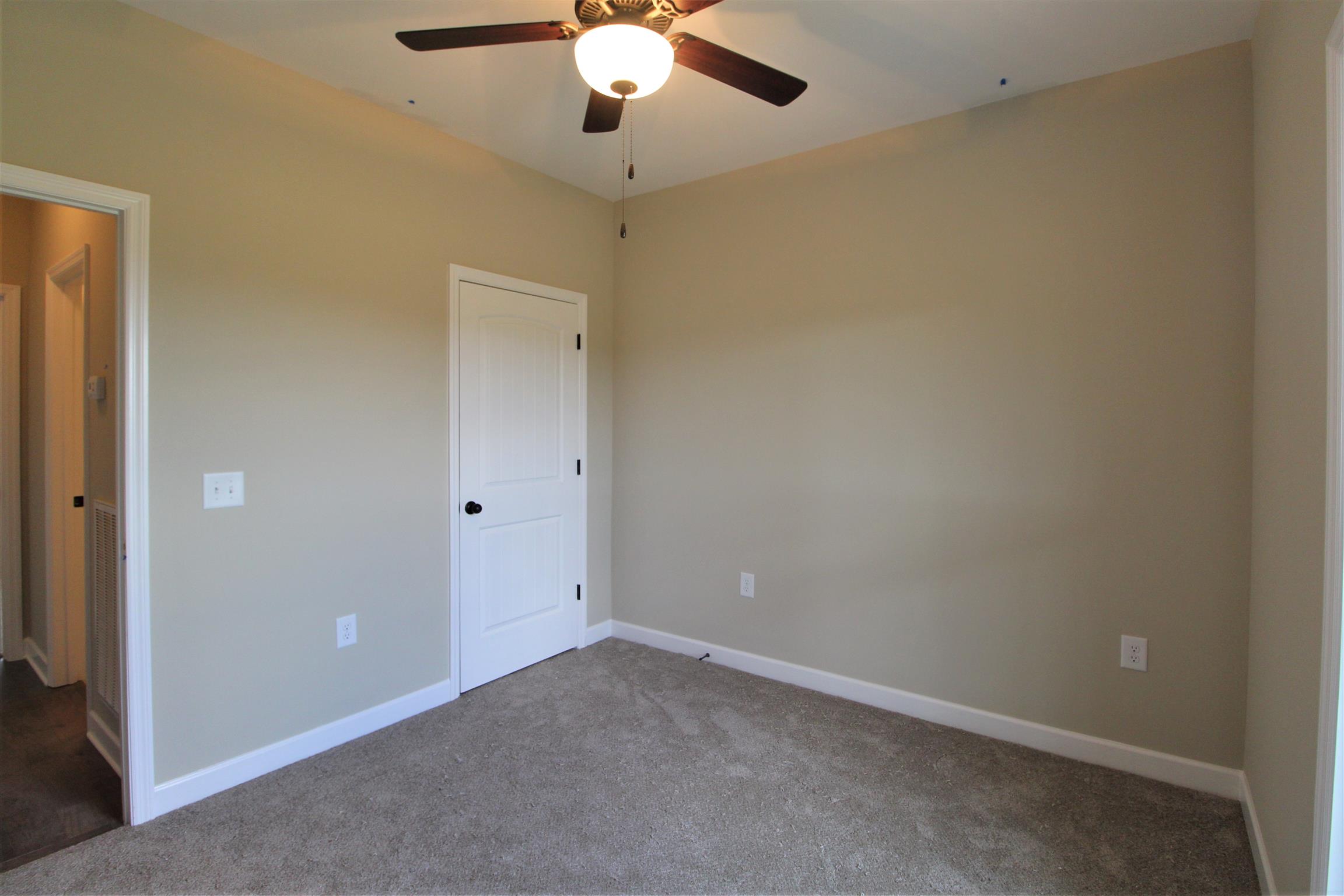2521 Turner Road Watertown, TN 37184 - Photo 18 of 23 an empty room with a ceiling fan and a window