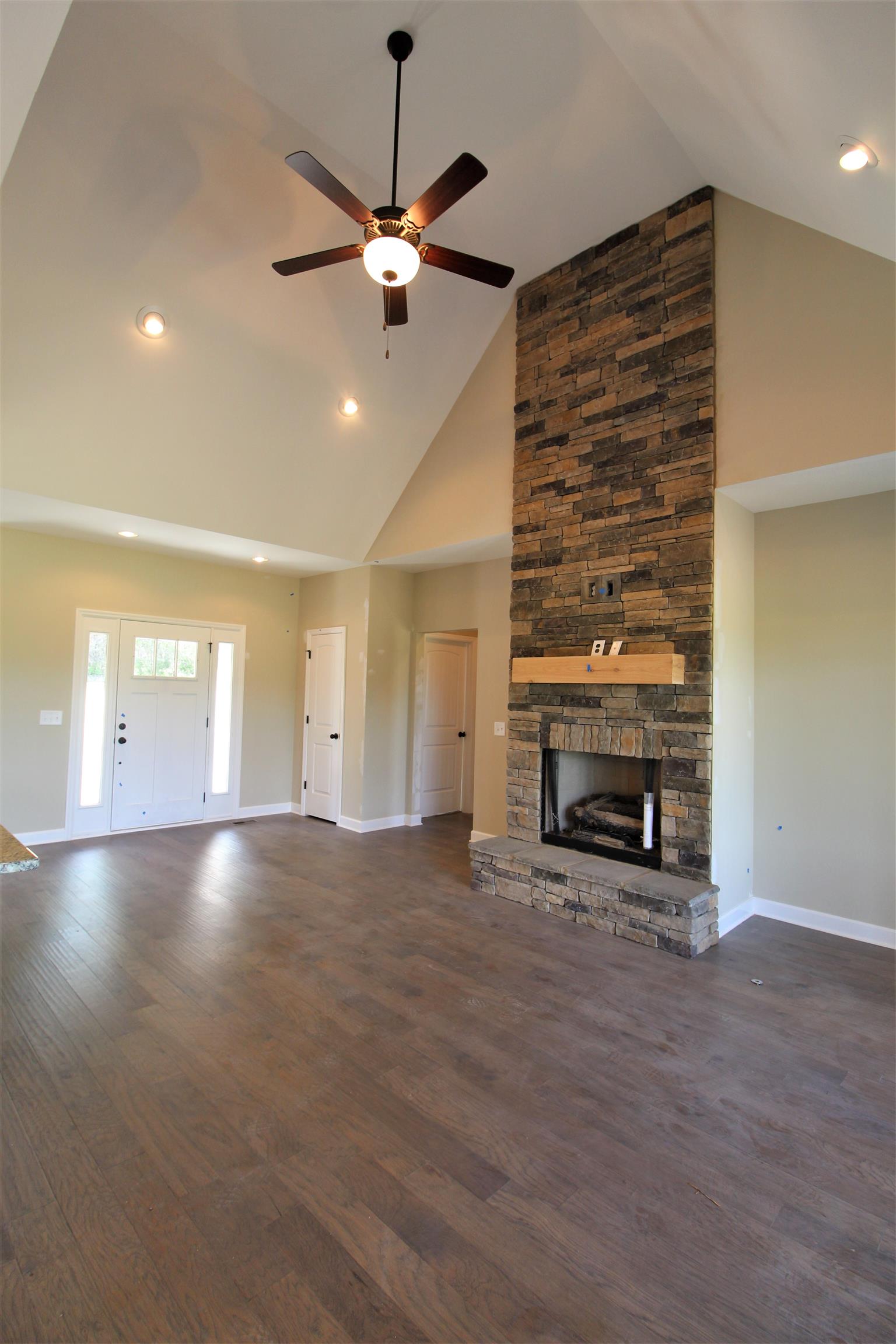 2521 Turner Road Watertown, TN 37184 - Photo 6 of 23 an empty room with windows and fireplace