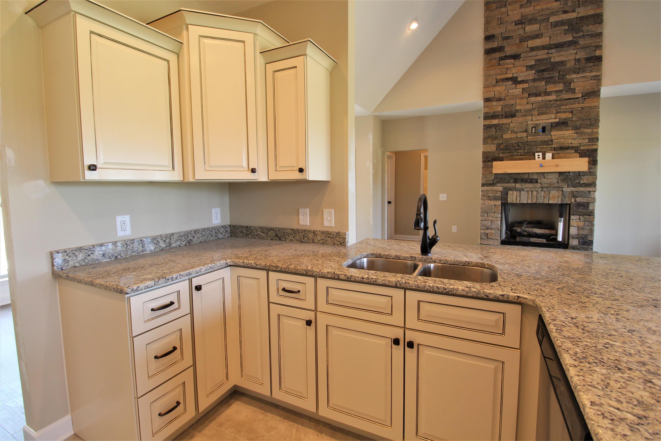 2521 Turner Road Watertown, TN 37184 - Photo 10 of 23 a kitchen with cabinets appliances and a counter top