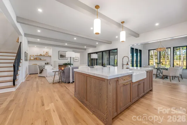 a large room with lots of counter space and furniture