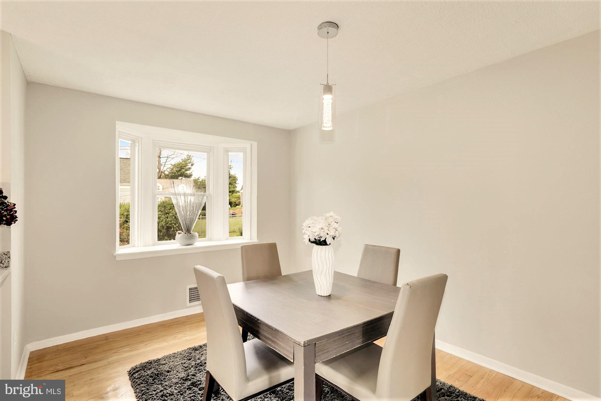 1120 Hollen Road Baltimore, MD 21239 - Photo 10 of 23 Dining Room with Bay Windows
