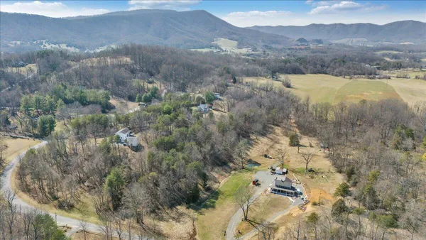 a view of mountain with yard