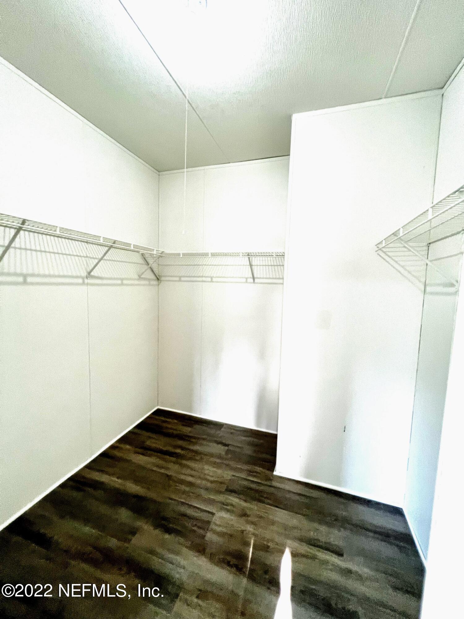 54176 Armstrong Road Callahan, FL 32011 - Photo 17 of 30 a view of small space with wooden floor