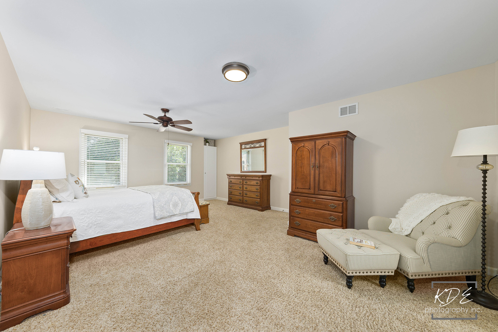 1403 Carlyle Road Naperville, IL 60564 - Photo 13 of 31 a spacious bedroom with a bed and furniture