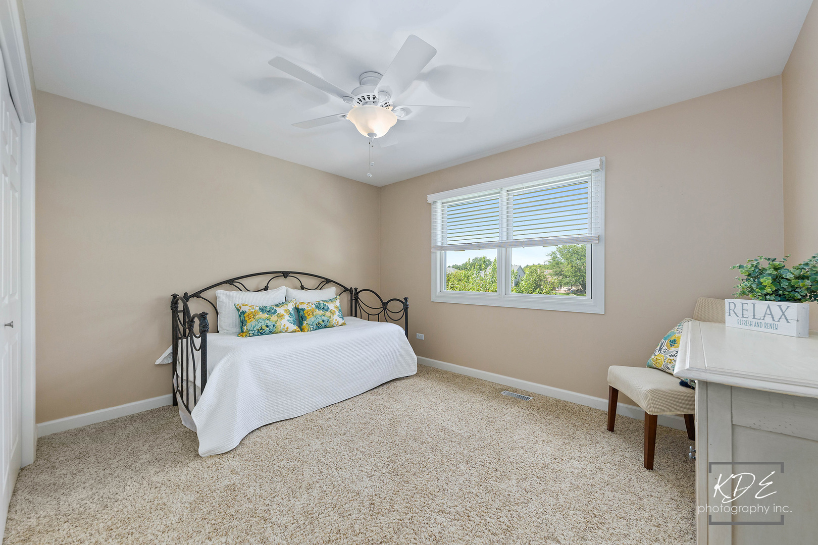1403 Carlyle Road Naperville, IL 60564 - Photo 19 of 31 a bed room with a bed and a window