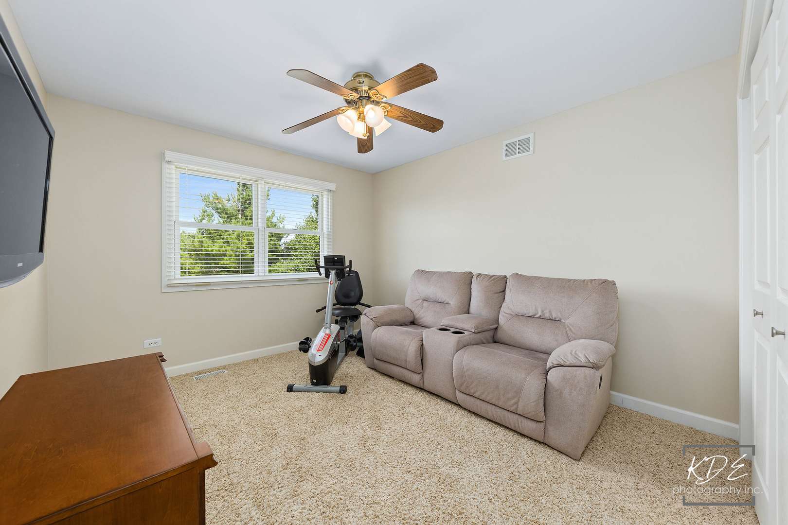 1403 Carlyle Road Naperville, IL 60564 - Photo 20 of 31 a living room with furniture and a window