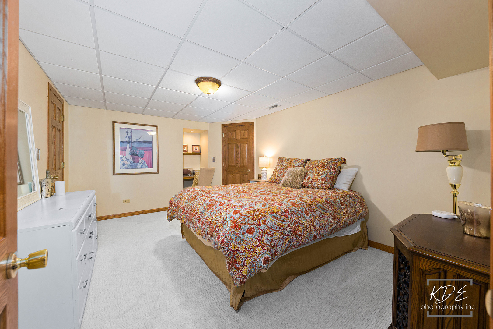 1403 Carlyle Road Naperville, IL 60564 - Photo 22 of 31 a spacious bedroom with a bed and a table in it
