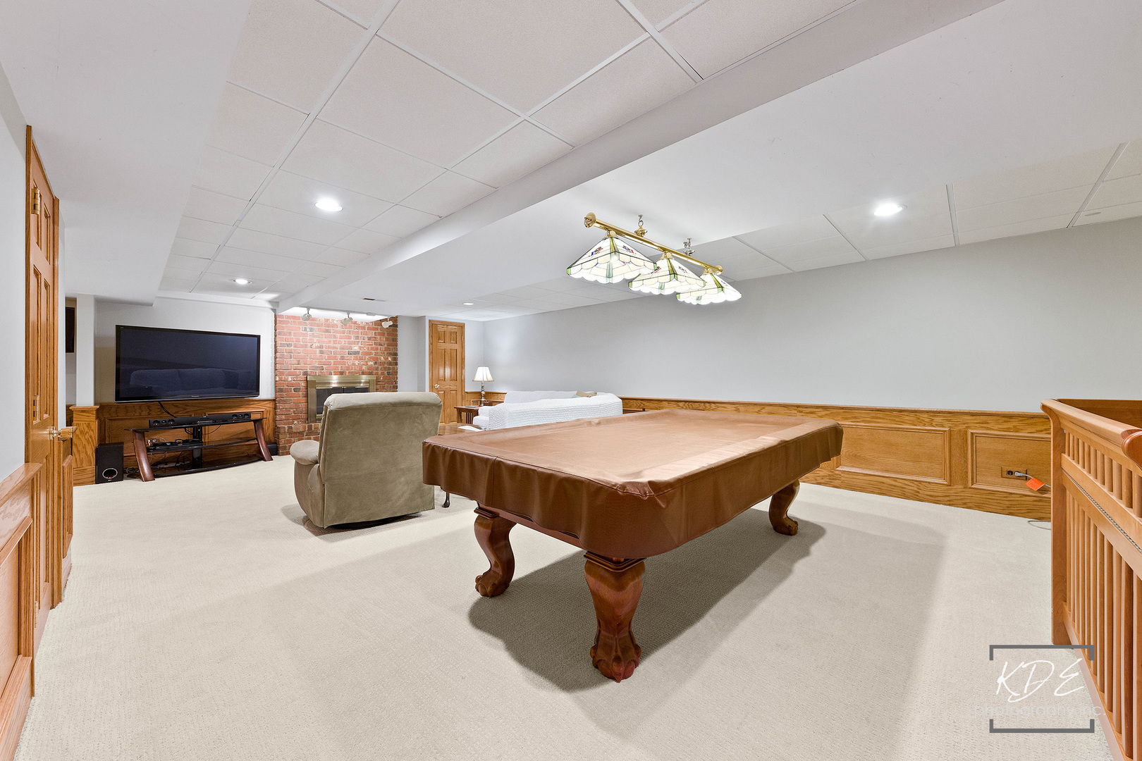 1403 Carlyle Road Naperville, IL 60564 - Photo 24 of 31 a spacious bedroom with a bed a television and a large window
