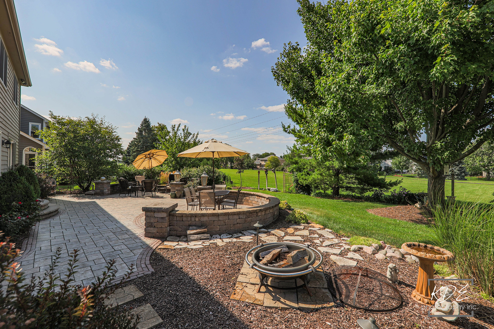1403 Carlyle Road Naperville, IL 60564 - Photo 29 of 31 a view of a backyard with plants and patio