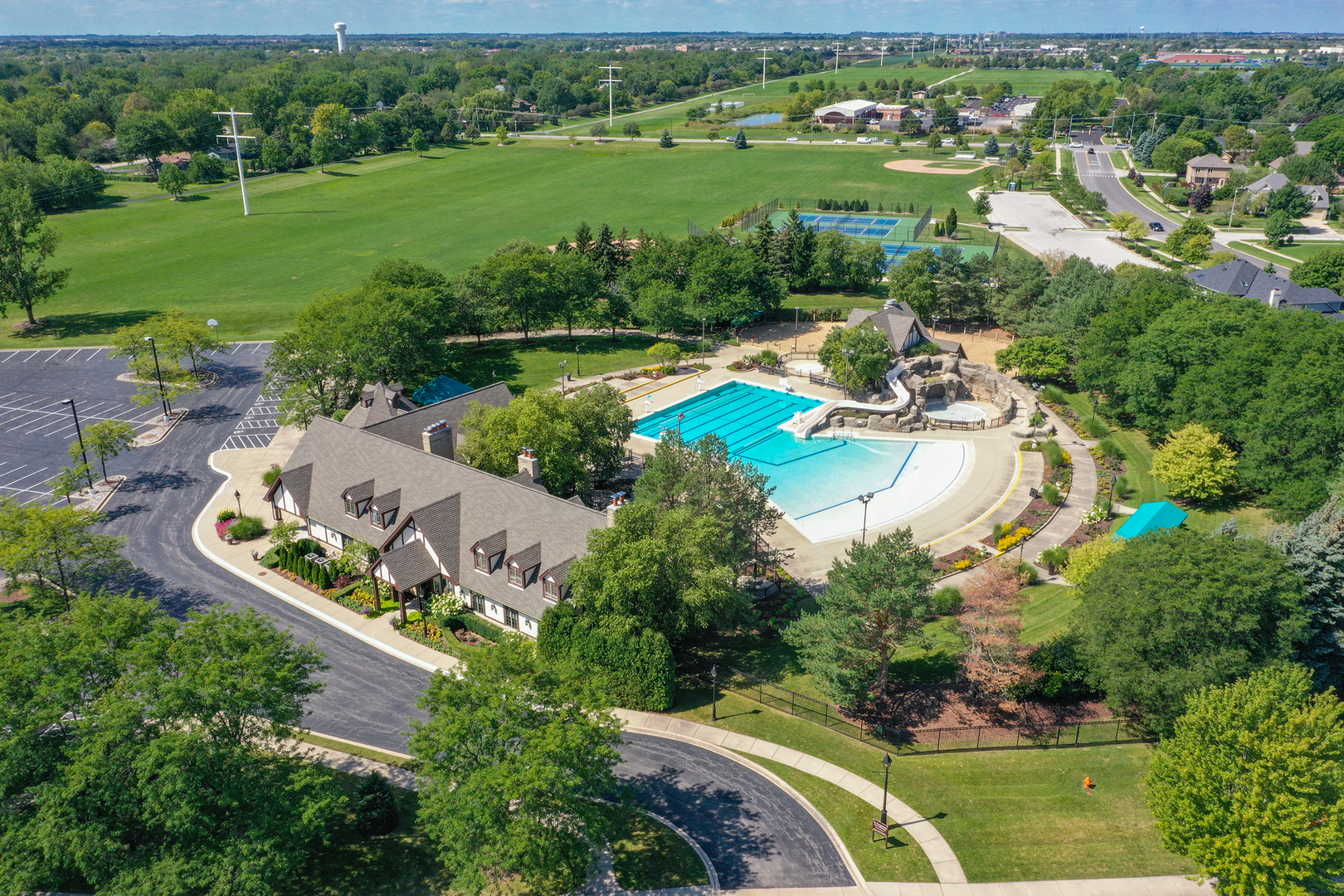 1403 Carlyle Road Naperville, IL 60564 - Photo 31 of 31 an aerial view of a house with a garden and lake view