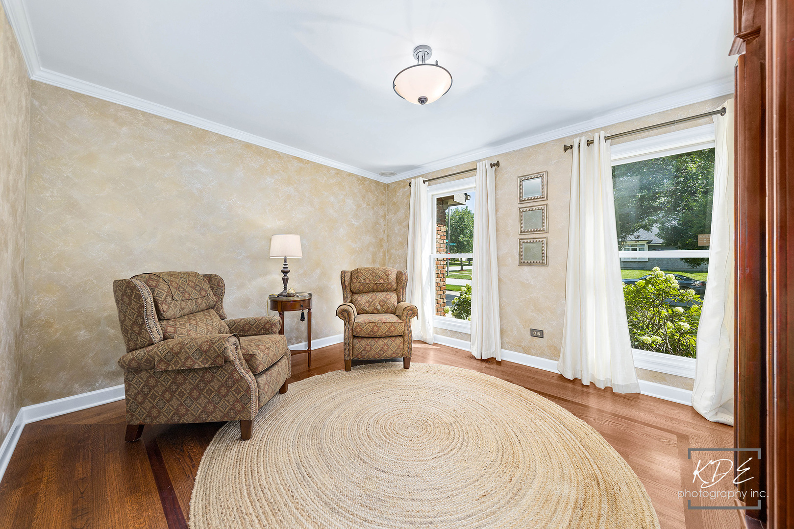 1403 Carlyle Road Naperville, IL 60564 - Photo 5 of 31 a spacious bedroom with a bed a couch and large window