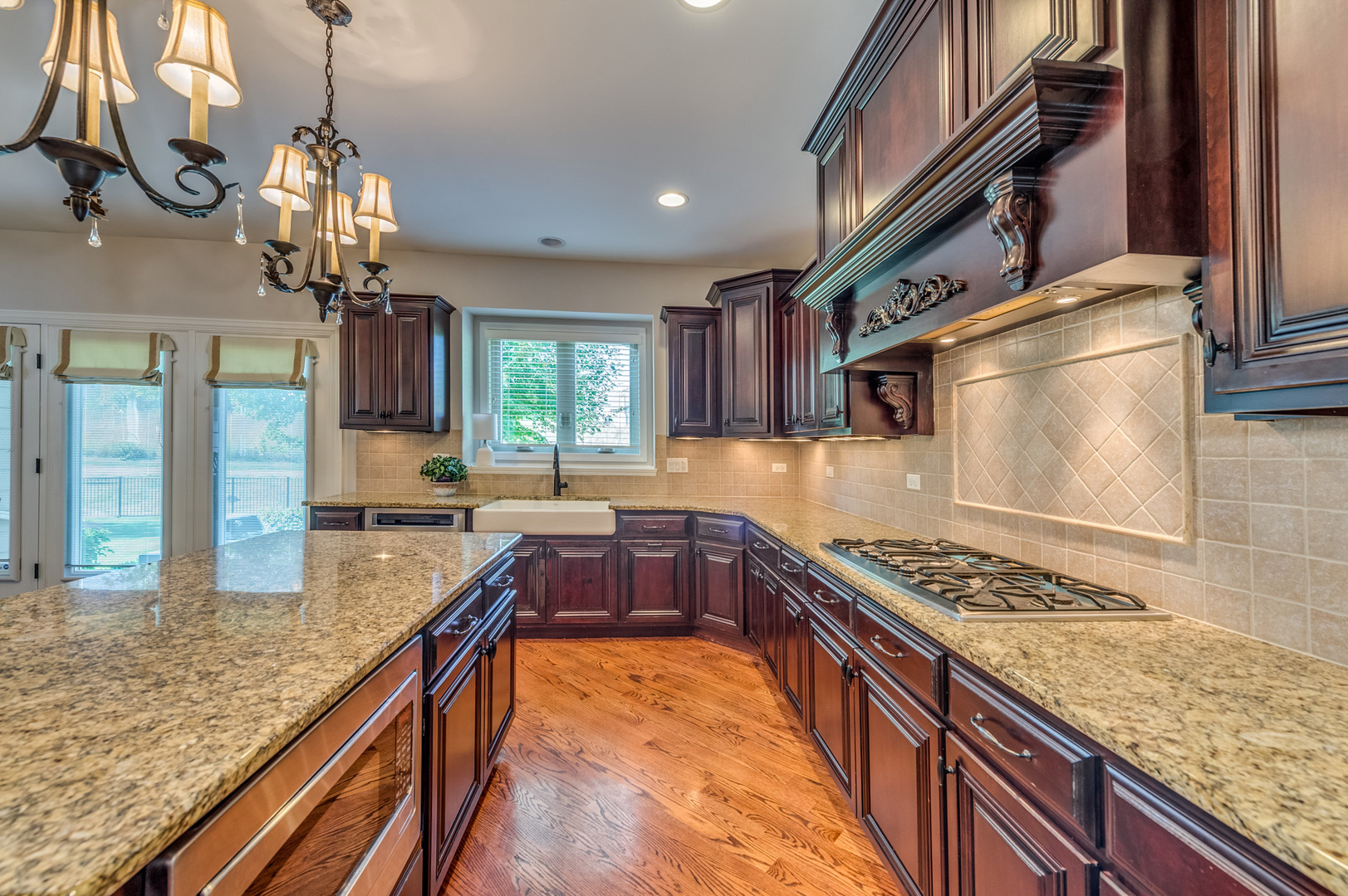 2918 Hapner Way Batavia, IL 60510 - Photo 11 of 43 a kitchen with stainless steel appliances granite countertop a sink stove and refrigerator