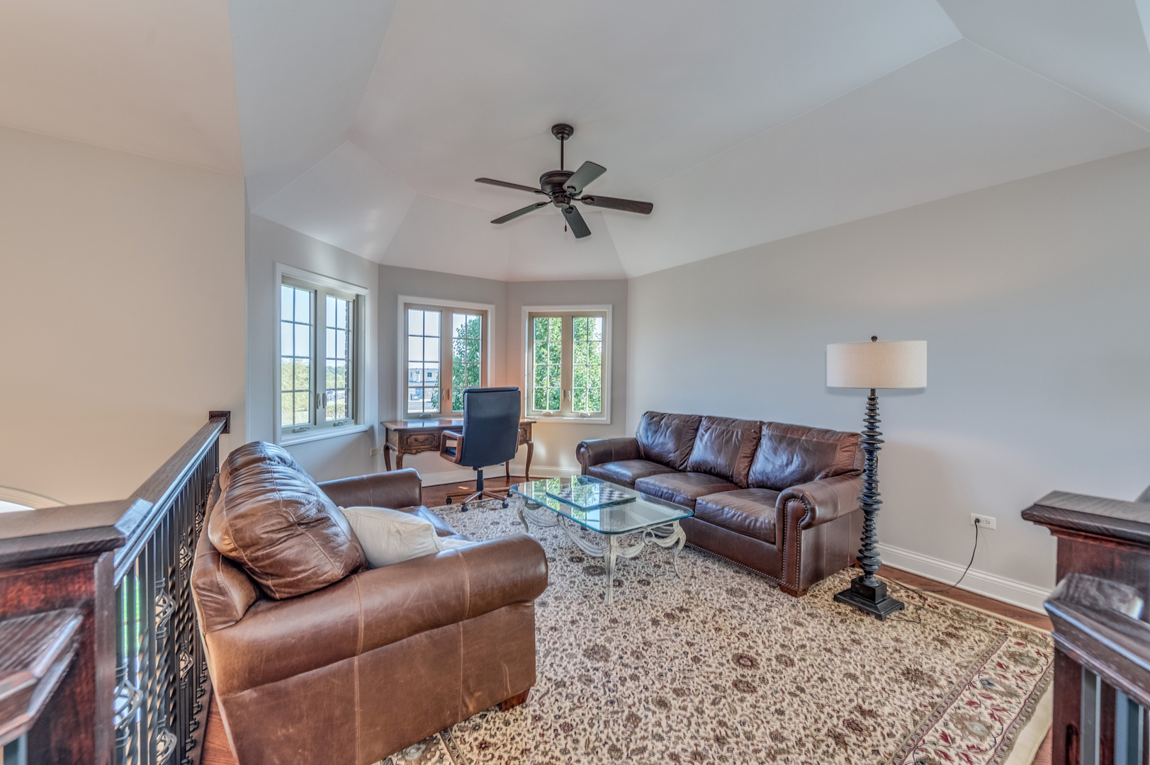 2918 Hapner Way Batavia, IL 60510 - Photo 20 of 43 a living room with furniture a ceiling fan and a rug
