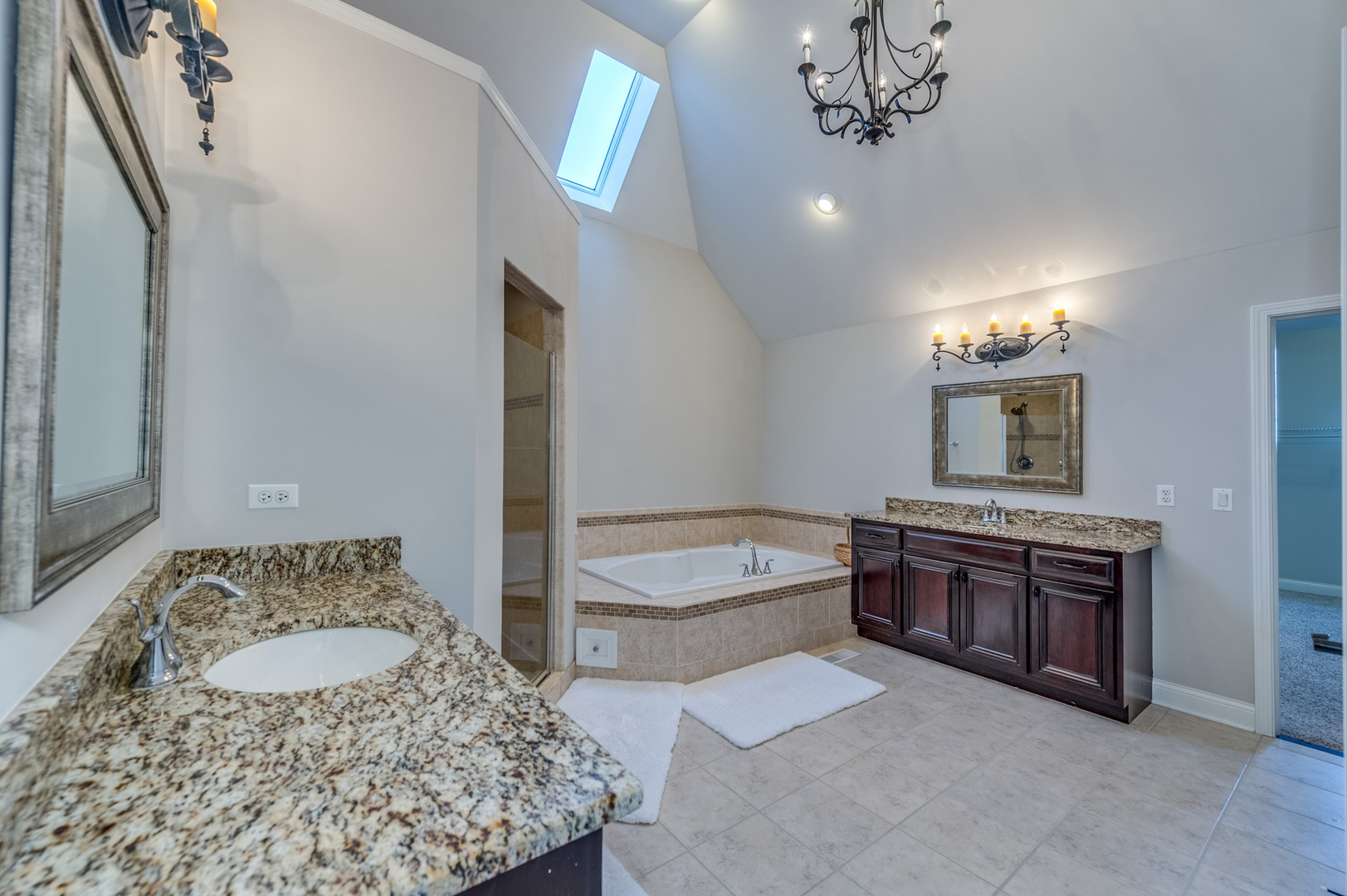 2918 Hapner Way Batavia, IL 60510 - Photo 23 of 43 a spacious bathroom with a tub double vanity and a shower