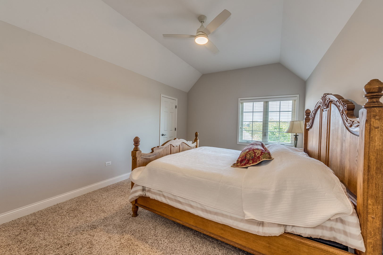 2918 Hapner Way Batavia, IL 60510 - Photo 26 of 43 a bedroom with a bed and a chandelier