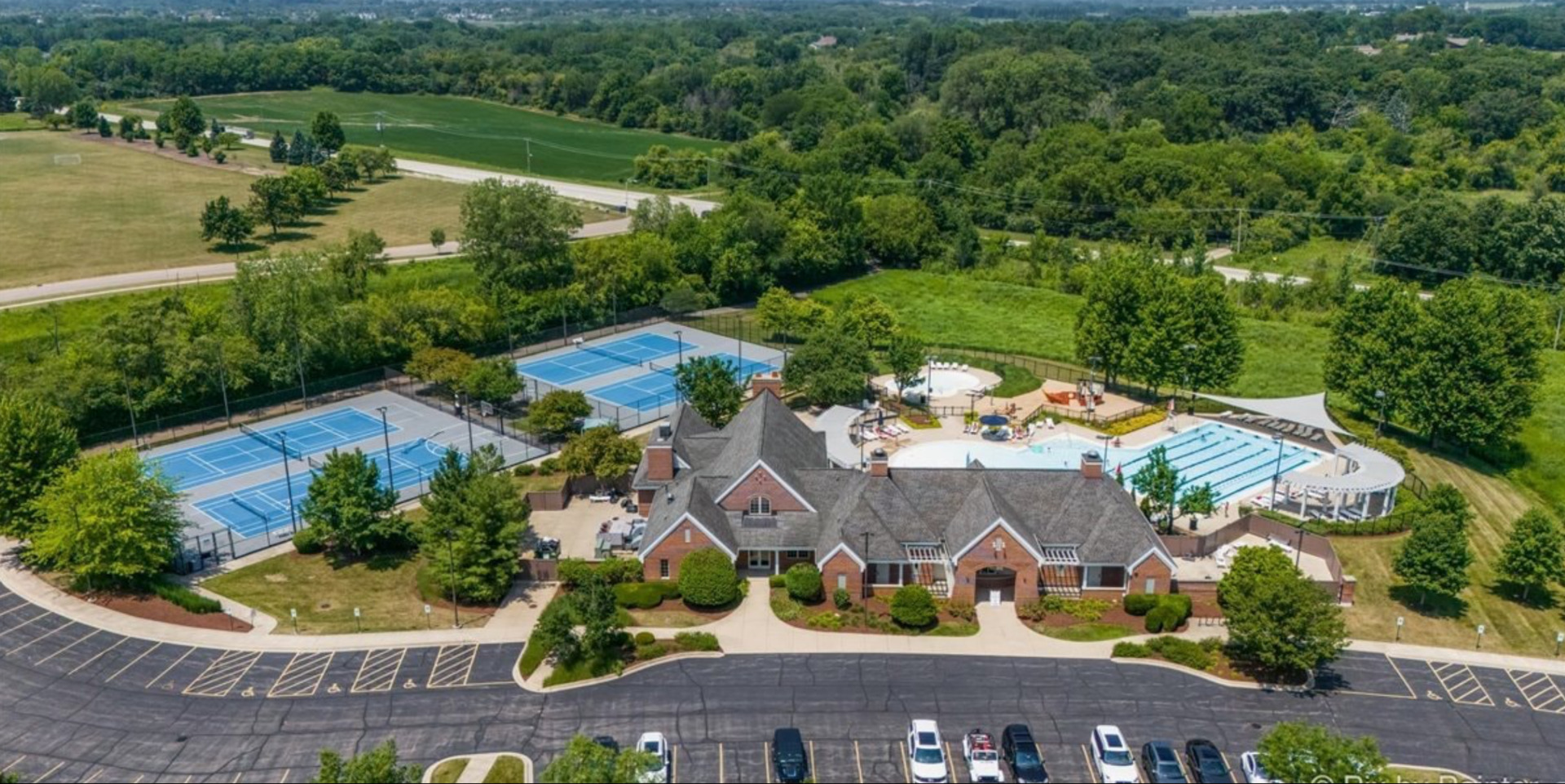 2918 Hapner Way Batavia, IL 60510 - Photo 42 of 43 an aerial view of a house with a garden and lake view