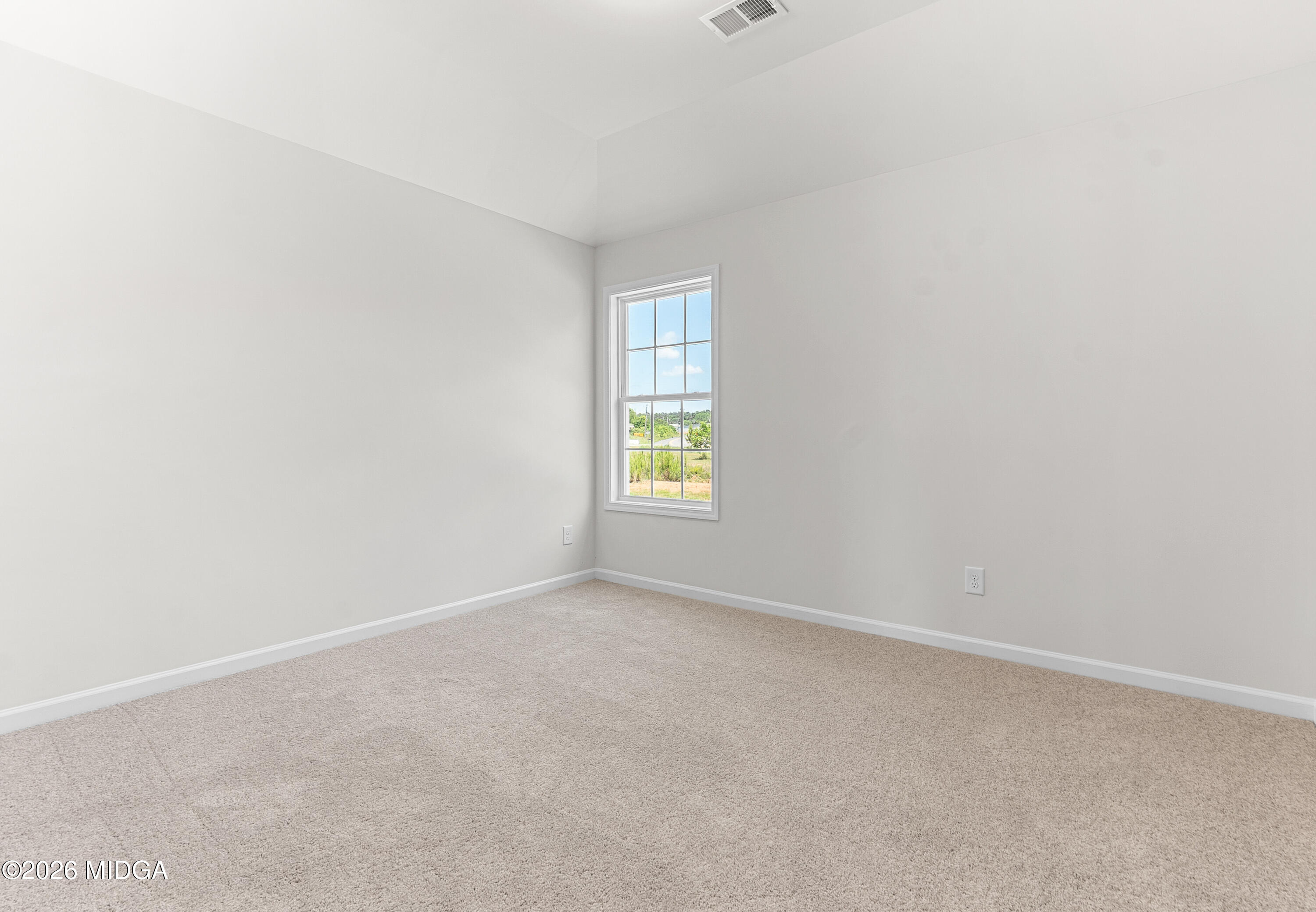 5393 Felles Way, Unit 359 Forsyth, GA 31029 - Photo 46 of 54 a view of an empty room with a window