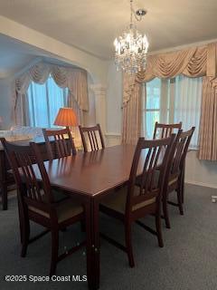 5361 Bison Street, Unit P19 Micco, FL 32976 - Photo 14 of 27 a view of a dining room with furniture and window