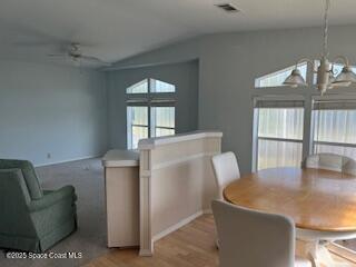 5361 Bison Street, Unit P19 Micco, FL 32976 - Photo 20 of 27 a living room with furniture and a window