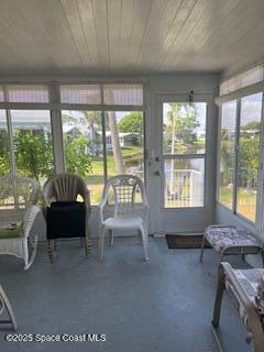 5361 Bison Street, Unit P19 Micco, FL 32976 - Photo 27 of 27 a living room with furniture and a floor to ceiling window
