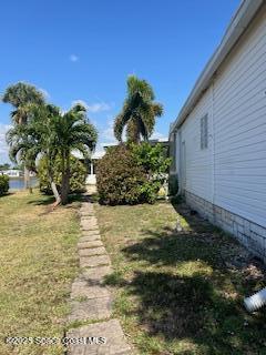 5361 Bison Street, Unit P19 Micco, FL 32976 - Photo 4 of 27 a view of a backyard of the house