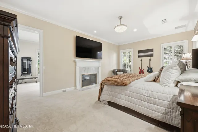 a view of a house with a backyard porch and sitting area