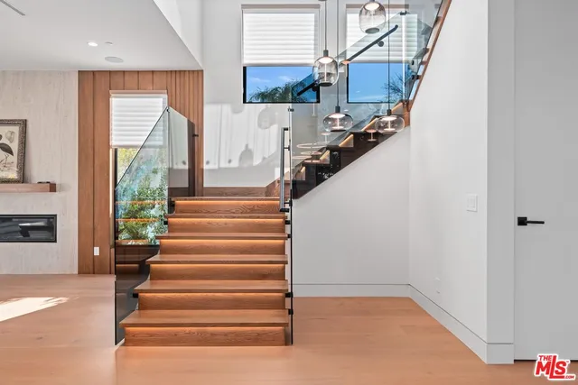 a view of a balcony with wooden floor